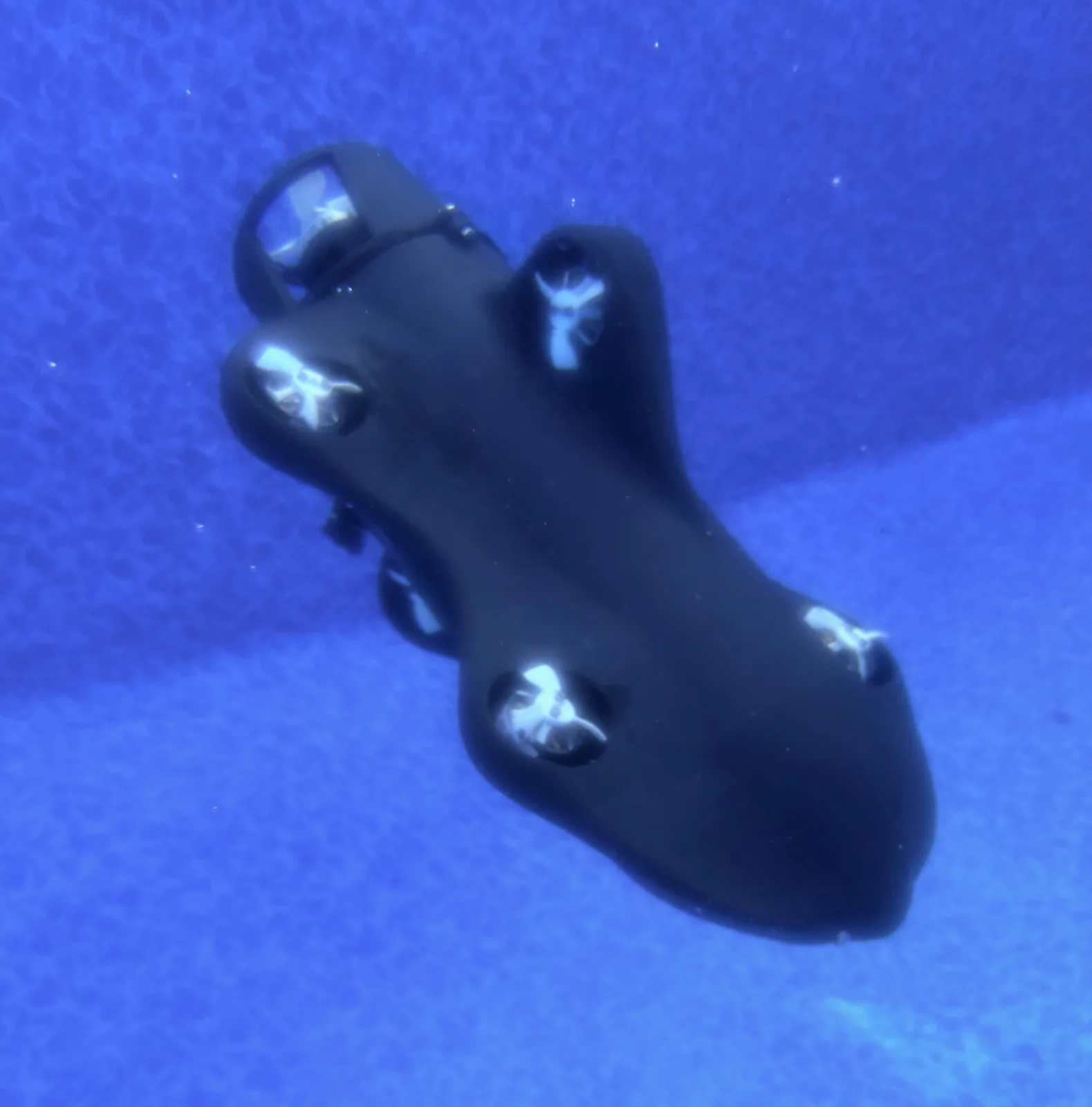 Vantage V0 AUV running submerged with its four thrusters